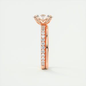 Oval cut solitaire Frank Darling lab grown diamond engagement ring with floral prongs, low profile basket and 1.8mm 3/4 french pave band in rose gold