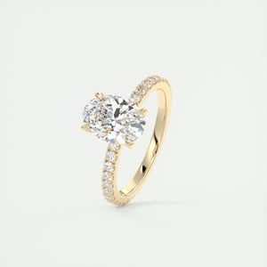 Oval cut solitaire Frank Darling lab grown diamond engagement ring with floral prongs, low profile basket and 1.8mm 3/4 french pave band in yellow gold