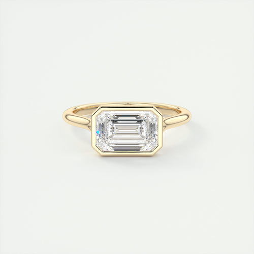 Floating east west emerald cut bezel Frank Darling diamond engagement ring yellow gold