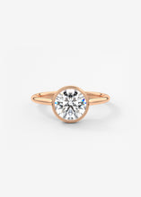 Vintage inspired round bezel set Frank Darling diamond engagement ring with millgrain detailing and a low profile trellis basket in rose gold
