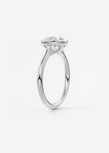 Vintage inspired round bezel set Frank Darling diamond engagement ring with millgrain detailing and a low profile trellis basket in platinum
