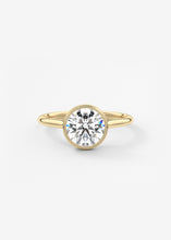 Vintage inspired round bezel set Frank Darling diamond engagement ring with millgrain detailing and a low profile trellis basket in yellow gold