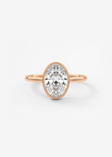 Vintage inspired oval bezel set Frank Darling diamond engagement ring with millgrain detailing and a low profile trellis basket in rose gold