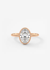 Vintage inspired oval bezel set Frank Darling diamond engagement ring with millgrain detailing and a low profile trellis basket in rose gold