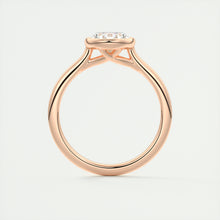 Vintage inspired oval bezel set Frank Darling diamond engagement ring with millgrain detailing and a low profile trellis basket in rose gold