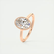 Vintage inspired oval bezel set Frank Darling diamond engagement ring with millgrain detailing and a low profile trellis basket in rose gold