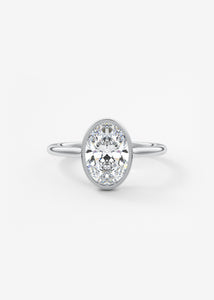 Vintage inspired oval bezel set Frank Darling diamond engagement ring with millgrain detailing and a low profile trellis basket in platinum
