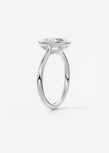 Vintage inspired oval bezel set Frank Darling diamond engagement ring with millgrain detailing and a low profile trellis basket in platinum
