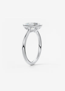 Vintage inspired oval bezel set Frank Darling diamond engagement ring with millgrain detailing and a low profile trellis basket in platinum
