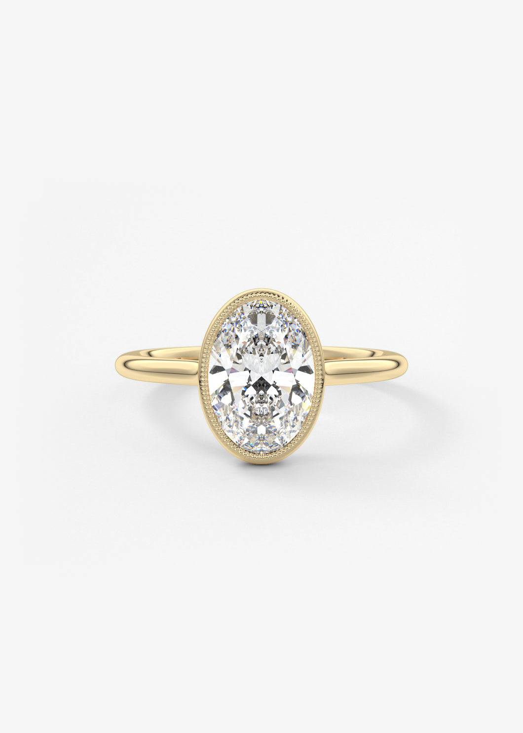 Vintage inspired oval bezel set Frank Darling diamond engagement ring with millgrain detailing and a low profile trellis basket in yellow gold