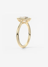 Vintage inspired oval bezel set Frank Darling diamond engagement ring with millgrain detailing and a low profile trellis basket in yellow gold