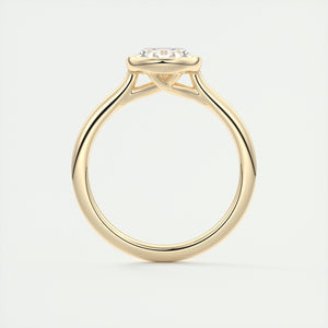 Vintage inspired oval bezel set Frank Darling diamond engagement ring with millgrain detailing and a low profile trellis basket in yellow gold