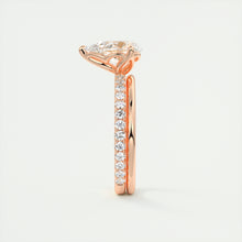 Three prong pear cut solitaire Frank Darling lab grown diamond engagement ring with floral prongs, low profile basket and 1.8mm french pave band in rose gold
