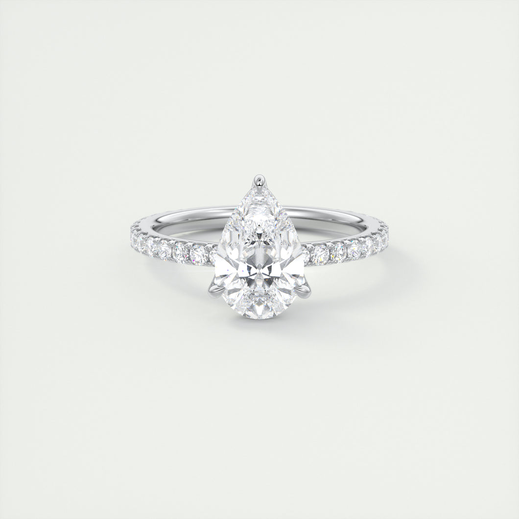 Three prong pear cut solitaire Frank Darling lab grown diamond engagement ring with floral prongs, low profile basket and 1.8mm french pave band in white gold