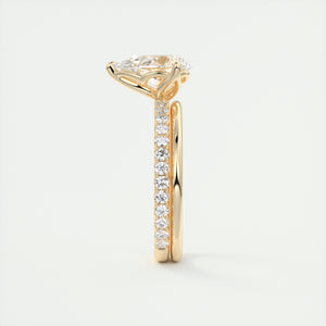 Three prong pear cut solitaire Frank Darling lab grown diamond engagement ring with floral prongs, low profile basket and 1.8mm french pave band in yellow gold