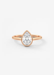 Vintage inspired pear bezel set Frank Darling diamond engagement ring with millgrain detailing and a low profile trellis basket in rose gold