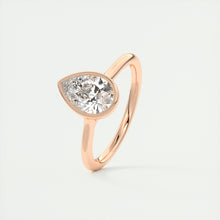 Vintage inspired pear bezel set Frank Darling diamond engagement ring with millgrain detailing and a low profile trellis basket in rose gold