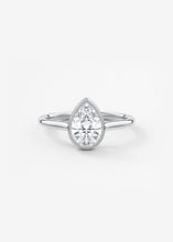 Vintage inspired pear bezel set Frank Darling diamond engagement ring with millgrain detailing and a low profile trellis basket in platinum