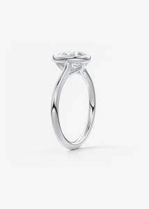 Vintage inspired pear bezel set Frank Darling diamond engagement ring with millgrain detailing and a low profile trellis basket in platinum