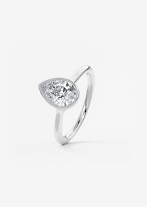 Vintage inspired pear bezel set Frank Darling diamond engagement ring with millgrain detailing and a low profile trellis basket in platinum
