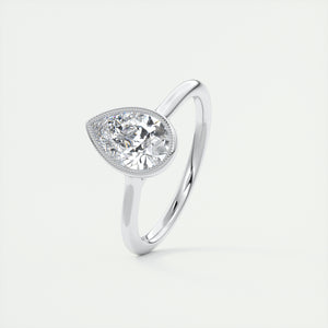 Vintage inspired pear bezel set Frank Darling diamond engagement ring with millgrain detailing and a low profile trellis basket in platinum