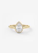 Vintage inspired pear bezel set Frank Darling diamond engagement ring with millgrain detailing and a low profile trellis basket in yellow gold