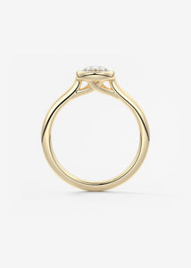 Vintage inspired pear bezel set Frank Darling diamond engagement ring with millgrain detailing and a low profile trellis basket in yellow gold