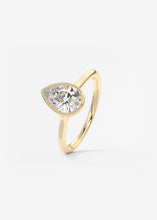 Vintage inspired pear bezel set Frank Darling diamond engagement ring with millgrain detailing and a low profile trellis basket in yellow gold