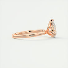 Pear cut solitaire Frank Darling lab grown diamond engagement ring with floral prongs, low profile basket and 1.8mm round band in rose gold