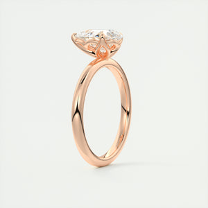 Pear cut solitaire Frank Darling lab grown diamond engagement ring with floral prongs, low profile basket and 1.8mm round band in rose gold