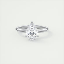 Pear cut solitaire Frank Darling lab grown diamond engagement ring with floral prongs, low profile basket and 1.8mm round band in white gold