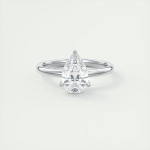 Pear cut solitaire Frank Darling lab grown diamond engagement ring with floral prongs, low profile basket and 1.8mm round band in white gold