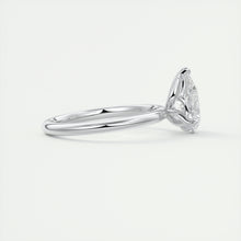 Pear cut solitaire Frank Darling lab grown diamond engagement ring with floral prongs, low profile basket and 1.8mm round band in white gold