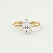 Pear cut solitaire Frank Darling lab grown diamond engagement ring with floral prongs, low profile basket and 1.8mm round band in yellow gold