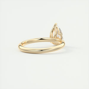 Pear cut solitaire Frank Darling lab grown diamond engagement ring with floral prongs, low profile basket and 1.8mm round band in yellow gold