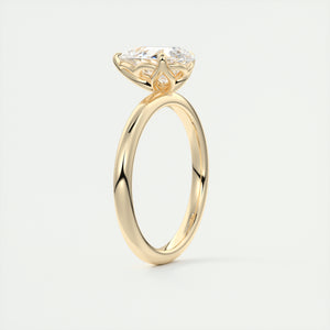 Pear cut solitaire Frank Darling lab grown diamond engagement ring with floral prongs, low profile basket and 1.8mm round band in yellow gold