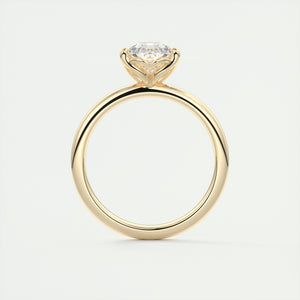 Pear cut solitaire Frank Darling lab grown diamond engagement ring with floral prongs, low profile basket and 1.8mm round band in yellow gold