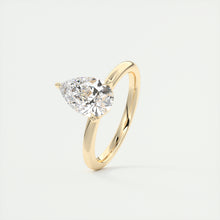 Pear cut solitaire Frank Darling lab grown diamond engagement ring with floral prongs, low profile basket and 1.8mm round band in yellow gold