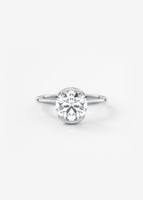 round half bezel engagement ring