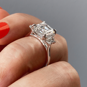 Asscher three stone Frank Darling diamond engagement ring with step cut trapezoid side stones in white gold