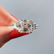 Asscher three stone Frank Darling diamond engagement ring with step cut trapezoid side stones in white gold
