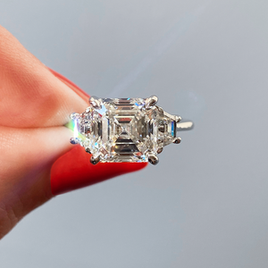 Asscher three stone Frank Darling diamond engagement ring with step cut trapezoid side stones in white gold